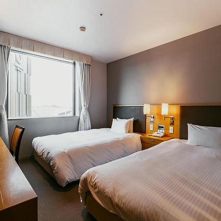 Oarks Canal Park Hotel Тояма Экстерьер фото